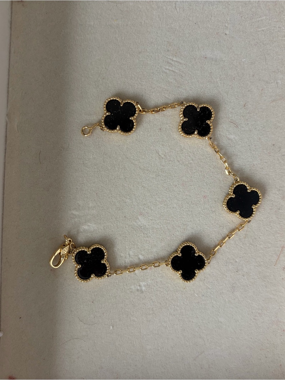 Gold Bracelet with Black Clover-Style Charms